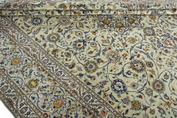 Close-up detail of 2000s Kashan rug from Iran / Persia showing Wool weave