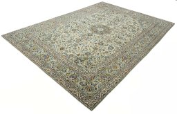 Corner detail of 2000s Kashan rug showing border pattern and Wool pile