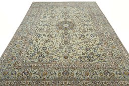 Surface texture of 2000s Kashan rug with natural Wool and intricate pattern