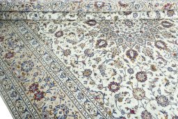 Close-up detail of 2000s Kashan rug from Iran / Persia showing Wool weave