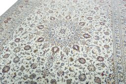 Backside of handmade 2000s Kashan rug showing knot structure and weave density