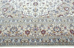 Full view of 2000s Kashan rug from Iran / Persia, 403 × 287 cm in Beige tones