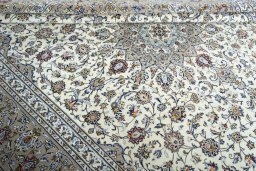 Close-up detail of 2000s Kashan rug from Iran / Persia showing Wool weave