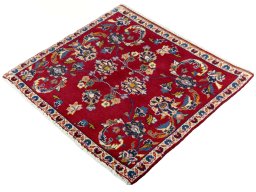 Corner detail of 2000s Kashan rug showing border pattern and Wool pile