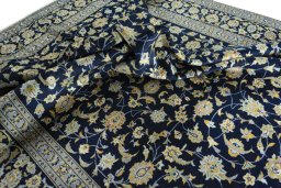Surface texture of 1970s Kashan rug with natural Wool and intricate pattern