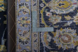 Close-up detail of 1970s Kashan rug from Iran / Persia showing Wool weave