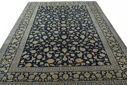 Surface texture of 1970s Kashan rug with natural Wool and intricate pattern
