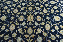Central medallion detail of 1970s Kashan rug from Iran / Persia