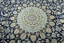 Central medallion detail of 2000s Kashan rug from Iran / Persia