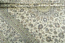 Close-up detail of 2000s Kashan rug from Iran / Persia showing Wool weave
