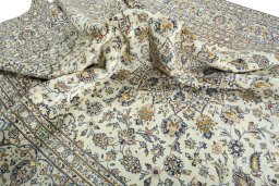 Surface texture of 2000s Kashan rug with natural Wool and intricate pattern