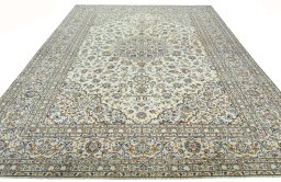Surface texture of 2000s Kashan rug with natural Wool and intricate pattern