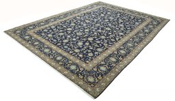 Corner detail of 2000s Kashan rug showing border pattern and Wool pile