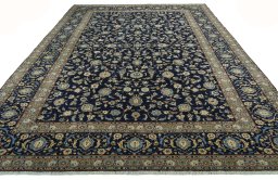 Surface texture of 2000s Kashan rug with natural Wool and intricate pattern