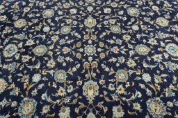 Central medallion detail of 2000s Kashan rug from Iran / Persia