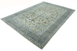 Corner detail of 2000s Kashan rug showing border pattern and Wool pile