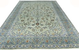 Surface texture of 2000s Kashan rug with natural Wool and intricate pattern