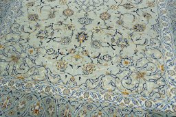 Close-up detail of 2000s Kashan rug from Iran / Persia showing Wool weave