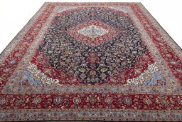 Surface texture of 2000s Kashan rug with natural Wool and intricate pattern