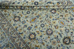 Close-up detail of 2000s Kashan rug from Iran / Persia showing Wool weave