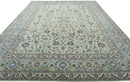 Surface texture of 2000s Kashan rug with natural Wool and intricate pattern
