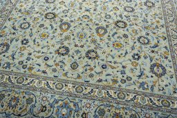 Close-up detail of 2000s Kashan rug from Iran / Persia showing Wool weave