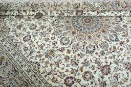 Close-up detail of 2000s Kashan rug from Iran / Persia showing Wool weave