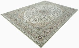 Corner detail of 2000s Kashan rug showing border pattern and Wool pile