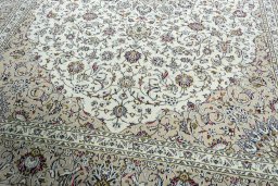 Close-up detail of 2000s Kashan rug from Iran / Persia showing Wool weave