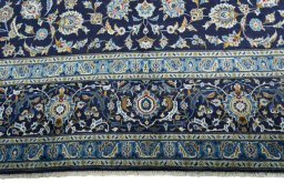 Central medallion detail of 2000s Kashan rug from Iran / Persia