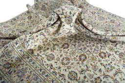 Surface texture of 1970s Kashan rug with natural Wool and intricate pattern