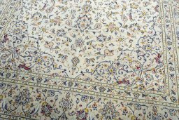 Close-up detail of 1970s Kashan rug from Iran / Persia showing Wool weave