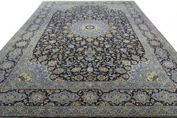 Surface texture of 2000s Kashan rug with natural Cork and intricate pattern