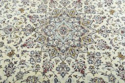 Central medallion detail of 2000s Kashan rug from Iran / Persia