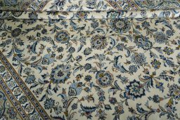 Close-up detail of 2000s Kashan rug from Iran / Persia showing Wool weave