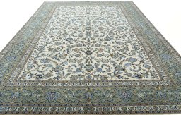 Surface texture of 2000s Kashan rug with natural Wool and intricate pattern
