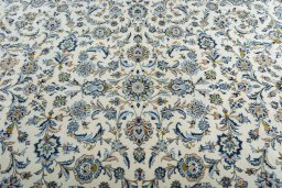 Central medallion detail of 2000s Kashan rug from Iran / Persia