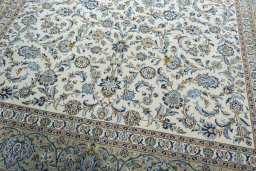 Close-up detail of 2000s Kashan rug from Iran / Persia showing Wool weave