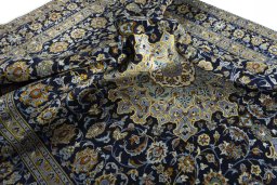 Surface texture of 1970s Kashan rug with natural Wool and intricate pattern