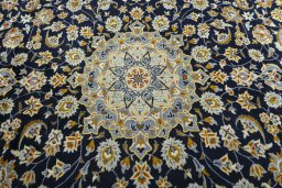 Central medallion detail of 2000s Kashan rug from Iran / Persia