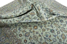 Surface texture of 1970s Kashan rug with natural Wool and intricate pattern