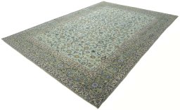Corner detail of 1970s Kashan rug showing border pattern and Wool pile