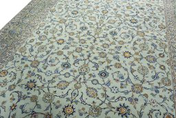 Backside of handmade 1970s Kashan rug showing knot structure and weave density