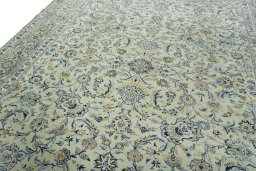 Backside of handmade 1970s Kashan rug showing knot structure and weave density