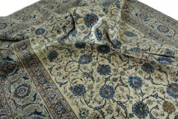 Surface texture of 2000s Kashan rug with natural Wool and intricate pattern