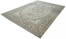 Corner detail of 2000s Kashan rug showing border pattern and Wool pile