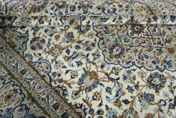 Close-up detail of 2000s Kashan rug from Iran / Persia showing Wool weave