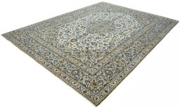 Corner detail of 2000s Kashan rug showing border pattern and Wool pile