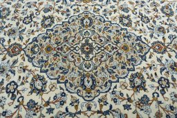 Central medallion detail of 2000s Kashan rug from Iran / Persia
