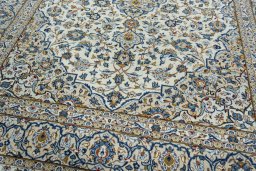 Close-up detail of 2000s Kashan rug from Iran / Persia showing Wool weave